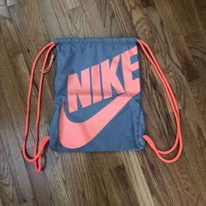 Nike gray and coral draw string backpack